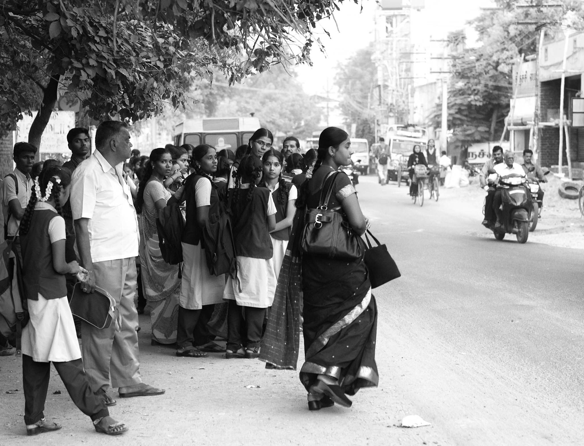 Students and staff are waiting for the city bus to home in the evening.
Virudhunagar, Tamil Nadu, India