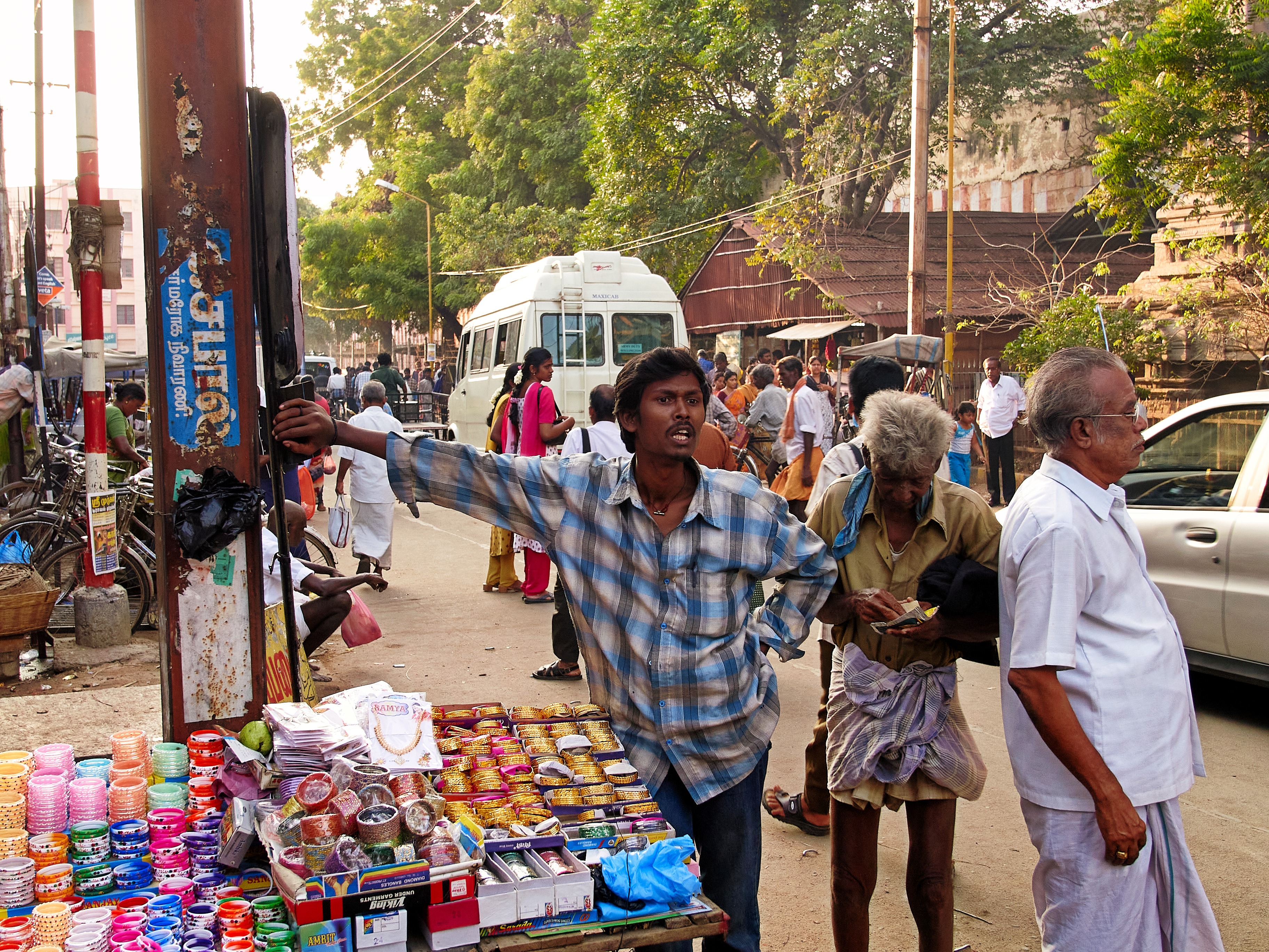 A street vendor selling bangles by the street, Madurai, Tamil Nadu, India